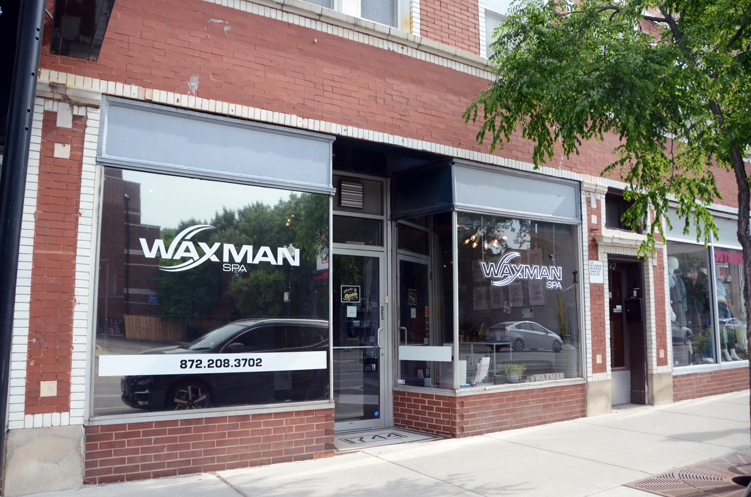 Photo of Wax Man Spa storefront on Lawrence Avenue